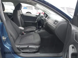 2015 Volkswagen Jetta Sedan 1.8T SE with VIN 3VWD17AJ5FM310694, listed as a IAAI auction lot 41735569 with 147,232 mi miles. Bid and sale history available at carsss.com. Image 5.