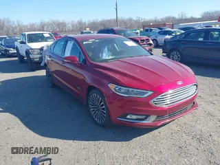 2018 Ford Fusion Energi Titanium with VIN 3FA6P0SU3JR106441, listed as a IAAI auction lot 41699936 with 146,330 mi miles. Bid and sale history available at carsss.com. Image 1.