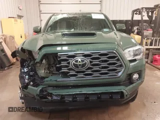 2022 Toyota Tacoma SR z VIN 3TYSZ5AN0NT094346, wystawiony jako IAAI lot #41715982 z przebiegiem 58 463 mil mil oraz . Historia ofert i sprzedaży dostępna na DreamBid. Obrazek 13.