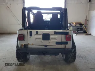 2006 Jeep Wrangler Rubicon with VIN 1J4FA69S26P734731, listed as a Copart auction lot 52009295 with 117,872 mi miles and Salvage title. Bid and sale history available at DreamBid. Image 6.
