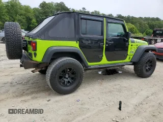 2013 Jeep Wrangler Unlimited Sport z VIN 1C4BJWDG6DL505416, wystawiony jako Copart lot #59910525 z przebiegiem 115 908 mil mil oraz Czysty tytuł • Clean title. Historia ofert i sprzedaży dostępna na DreamBid. Obrazek 3.