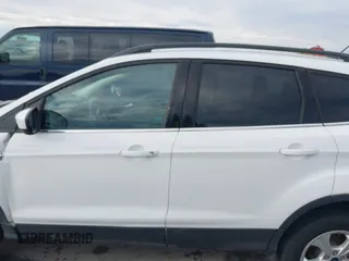 2015 Ford Escape SE with VIN 1FMCU0GX2FUB33893, listed as a IAAI auction lot 41455605 with 128,383 mi miles. Bid and sale history available at carsss.com. Image 14.
