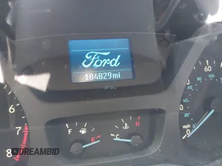 2017 Ford Transit Cargo with VIN 1FTYE1CM4HKB25432, listed as a IAAI auction lot 41830840 with 184,829 mi miles and . Bid and sale history available at carsss.com. Image 7.