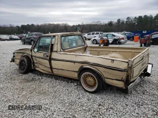 1982 Volkswagen Rabbit z VIN 1V1KG0175CV012235, wystawiony jako Copart lot #86112834 z przebiegiem 186 959 mil mil oraz Szkody całkowita. Historia ofert i sprzedaży dostępna na DreamBid. Obrazek 2.