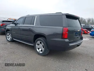 2015 Chevrolet Suburban LTZ with VIN 1GNSKKKC4FR712965, listed as a IAAI auction lot 41928053 with 188,571 mi miles. Bid and sale history available at carsss.com. Image 3.