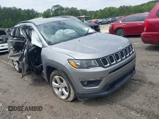 2019 Jeep Compass Latitude with VIN 3C4NJCBB3KT851086, listed as a IAAI auction lot 42248059 with 149,351 mi miles and . Bid and sale history available at DreamBid. Image 1.