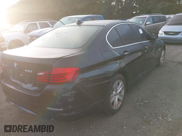2013 BMW 5 Series 528i xDrive with VIN WBAXH5C57DD109496, listed as a IAAI auction lot 40436340 with Not Provided miles and . Bid and sale history available at carsss.com. Image 4.