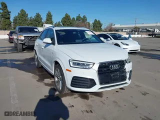 2018 Audi Q3 Premium Plus with VIN WA1JCCFS0JR023467, listed as a IAAI auction lot 41338155 with 58,651 mi miles. Bid and sale history available at carsss.com. Image 1.