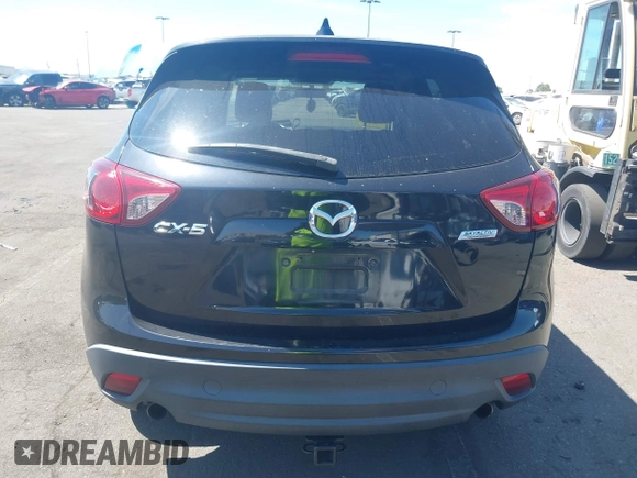 2013 Mazda CX-5 Touring with VIN JM3KE2CEXD0153589, listed as a IAAI auction lot 41855356 with 86,030 mi miles and . Bid and sale history available at DreamBid. Image 16.