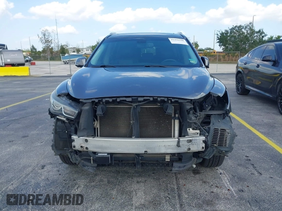 2016 Infiniti QX60 with VIN 5N1AL0MM1GC510760, listed as a IAAI auction lot 41990248 with 60,296 mi miles and . Bid and sale history available at DreamBid. Image 12.