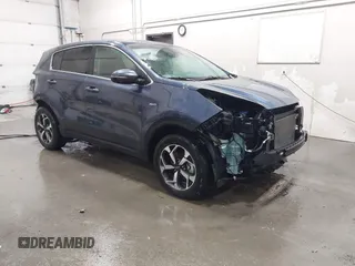 2021 Kia Sportage LX with VIN KNDPMCAC2M7877132, listed as a IAAI auction lot 41443934 with 9,528 mi miles. Bid and sale history available at carsss.com. Image 1.