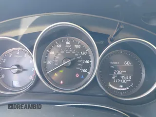 2014 Mazda CX-5 Touring с VIN JM3KE2CY7E0341630, выставлен на аукционе IAAI как лот 40830171 с пробегом 117 430 миль миль и . История ставок и продаж доступна на DreamBid. Изображение 7.