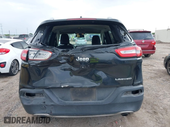 2014 Jeep Cherokee Limited with VIN 1C4PJLDS8EW104085, listed as a IAAI auction lot 42104059 with 141,951 mi miles and . Bid and sale history available at DreamBid. Image 16.