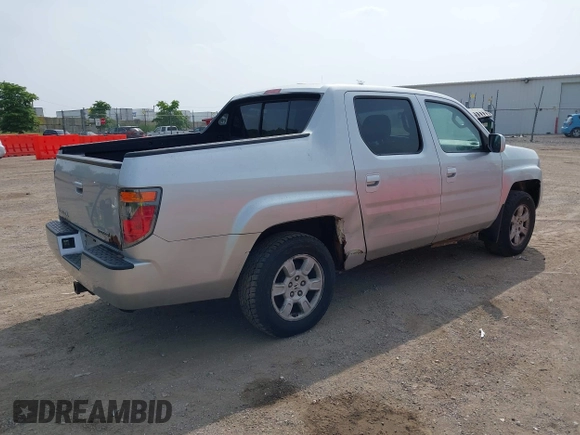 2007 Honda Ridgeline RTL z VIN 2HJYK16517H530890, wystawiony jako IAAI lot #42521976 z przebiegiem 285 222 mil mil oraz . Historia ofert i sprzedaży dostępna na DreamBid. Obrazek 4.