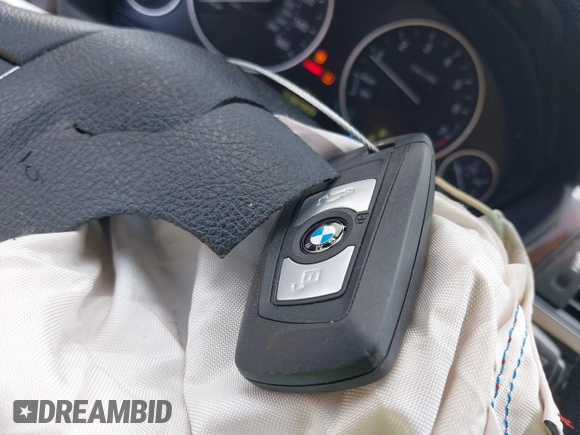 2015 BMW 3 Series 328i xDrive with VIN WBA3B5G56FNS15848, listed as a IAAI auction lot 42537645 with 121,742 mi miles and . Bid and sale history available at DreamBid. Image 11.