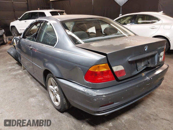 2001 BMW 3 Series 325Ci with VIN WBABN33471JW48292, listed as a IAAI auction lot 41557412 with 118,000 mi miles. Bid and sale history available at carsss.com. Image 3.