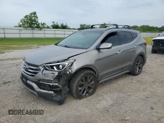 2017 Hyundai Santa Fe Ultimate z VIN 5XYZW4LA4HG488067, wystawiony jako Copart lot #54984005 z przebiegiem 100 784 mil mil oraz Szkoda całkowita • Salvage title. Historia ofert i sprzedaży dostępna na DreamBid. Obrazek 1.