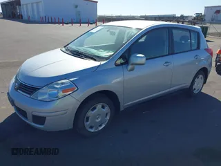 2009 Nissan Versa 1.8 S with VIN 3N1BC13E09L502085, listed as a IAAI auction lot 41869799 with 104,078 mi miles. Bid and sale history available at carsss.com. Image 2.