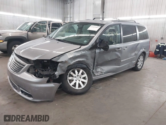 2013 Chrysler Town & Country Touring with VIN 2C4RC1BG9DR714736, listed as a IAAI auction lot 41824364 with 156,486 mi miles. Bid and sale history available at carsss.com. Image 2.