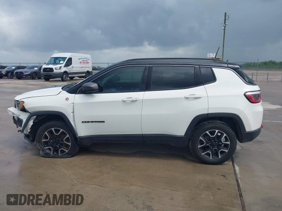 2020 Jeep Compass Trailhawk with VIN 3C4NJDDB3LT118928, listed as a IAAI auction lot 42128120 with 95,477 mi miles and . Bid and sale history available at DreamBid. Image 14.