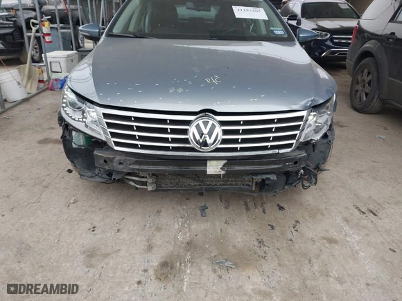 2013 Volkswagen CC Sport with VIN WVWBN7AN8DE560127, listed as a IAAI auction lot 41187465 with 157,182 mi miles. Bid and sale history available at carsss.com. Image 6.