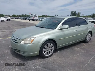 2007 Toyota Avalon XL with VIN 4T1BK36B27U219456, listed as a IAAI auction lot 41747807 with 169,599 mi miles. Bid and sale history available at carsss.com. Image 2.