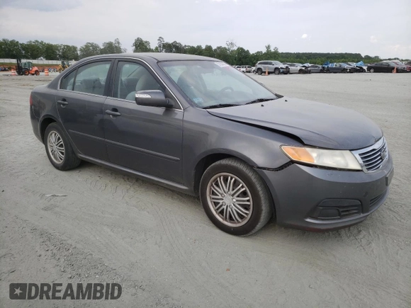 2009 Kia Optima LX z VIN KNAGE228695331919, wystawiony jako Copart lot #57804835 z przebiegiem 199 204 mil mil oraz Szkoda całkowita • Salvage title. Historia ofert i sprzedaży dostępna na DreamBid. Obrazek 4.