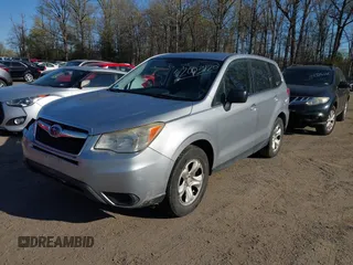2015 Subaru Forester 2.5i with VIN JF2SJAAC5FG520328, listed as a IAAI auction lot 42003120 with 227,222 mi miles. Bid and sale history available at carsss.com. Image 2.