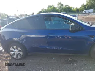 2023 Tesla Model Y Long Range with VIN 7SAYGDEE0PF671726, listed as a IAAI auction lot 42393616 with Not provided miles and . Bid and sale history available at DreamBid. Image 13.