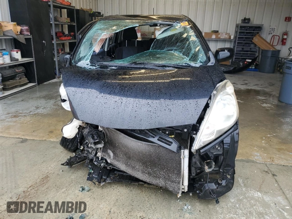 2010 Honda Fit Sport with VIN JHMGE8H48AS019874, listed as a Copart auction lot 58463765 with Not provided miles and Salvage title. Bid and sale history available at DreamBid. Image 5.