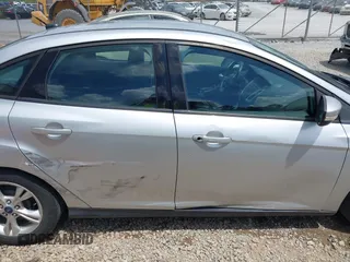 2014 Ford Focus SE with VIN 1FADP3F28EL162669, listed as a IAAI auction lot 42128555 with 104,265 mi miles and . Bid and sale history available at carsss.com. Image 13.