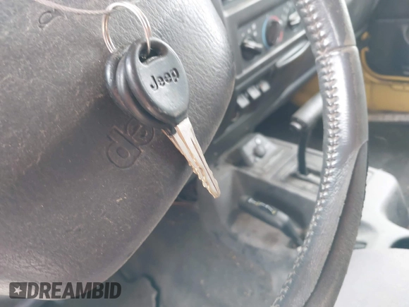 2000 Jeep Wrangler Sport with VIN 1J4FA49S3YP781614, listed as a IAAI auction lot 42292668 with 152,600 mi miles and . Bid and sale history available at DreamBid. Image 11.