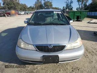 1998 Mercury Mystique z VIN 1MELM6534WK600653, wystawiony jako Copart lot #45148215 z przebiegiem 122 878 mil mil oraz Szkody całkowita. Historia ofert i sprzedaży dostępna na DreamBid. Obrazek 5.