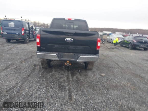 2018 Ford F-150 XL with VIN 1FTEW1E51JFC55334, listed as a IAAI auction lot 41485040 with 122,169 mi miles. Bid and sale history available at carsss.com. Image 16.