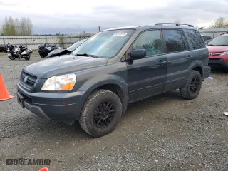2004 Honda Pilot EX with VIN 2HKYF18604H548587, listed as a Copart auction lot 52141915 with 214,000 mi miles and Salvage Title. Bid and sale history available at carsss.com. Image 1.