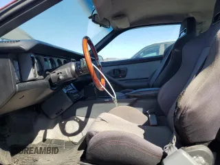 1990 Pontiac Firebird с VIN 1G2FS23T2LL206191, выставлен на аукционе Copart как лот 76175064 с пробегом 103 903 миль миль и Списание • Salvage title. История ставок и продаж доступна на DreamBid. Изображение 7.