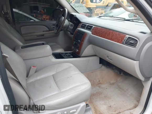 2007 Chevrolet Tahoe LT z VIN 1GNFC13J37R113756, wystawiony jako IAAI lot #42021634 z przebiegiem 247 631 mil mil oraz . Historia ofert i sprzedaży dostępna na DreamBid. Obrazek 5.
