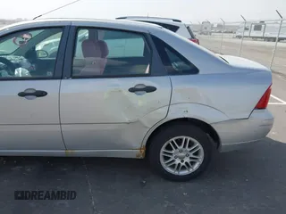 2007 Ford Focus S with VIN 1FAHP34N57W188274, listed as a IAAI auction lot 41753738 with Not Provided miles and . Bid and sale history available at carsss.com. Image 14.