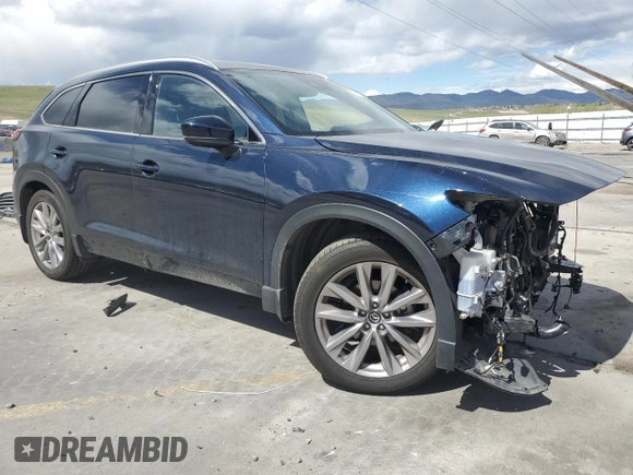 2021 Mazda CX-9 Grand Touring with VIN JM3TCBDY6M0512276, listed as a Copart auction lot 54582375 with 26,727 mi miles and Salvage title. Bid and sale history available at DreamBid. Image 4.