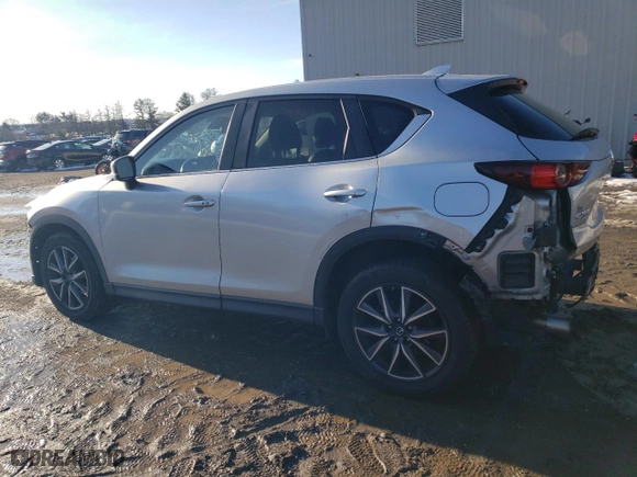 2018 Mazda CX-5 Touring with VIN JM3KFBCM9J0343240, listed as a Copart auction lot 88751245 with 132,038 mi miles and Salvage Title. Bid and sale history available at carsss.com. Image 2.