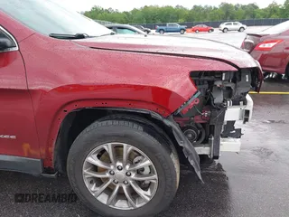 2019 Jeep Cherokee Latitude Plus with VIN 1C4PJMLB2KD104856, listed as a IAAI auction lot 42097709 with 89,552 mi miles and . Bid and sale history available at DreamBid. Image 18.