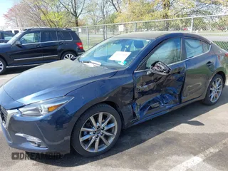 2018 Mazda 3 Grand Touring with VIN 3MZBN1W36JM213063, listed as a IAAI auction lot 42102460 with 49,180 mi miles and . Bid and sale history available at DreamBid. Image 6.