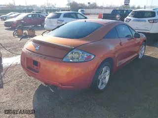 2007 Mitsubishi Eclipse GS with VIN 4A3AK24FX7E044090, listed as a IAAI auction lot 41755462 with 113,636 mi miles. Bid and sale history available at carsss.com. Image 4.