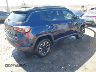 2020 Jeep Compass Trailhawk with VIN 3C4NJDDB1LT106549, listed as a IAAI auction lot 41885628 with 98,374 mi miles and . Bid and sale history available at DreamBid. Image 4.