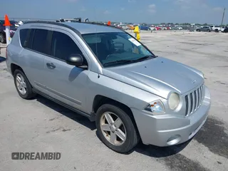 2008 Jeep Compass Sport with VIN 1J8FT47048D767281, listed as a IAAI auction lot 42010343 with 164,734 mi miles. Bid and sale history available at carsss.com. Image 1.