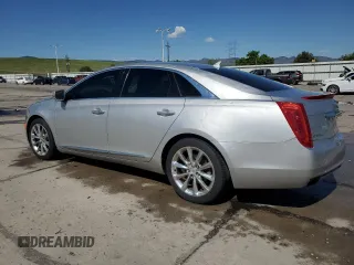 2013 Cadillac XTS Luxury with VIN 2G61R5S32D9131914, listed as a Copart auction lot 56569505 with 123,427 mi miles and Salvage title. Bid and sale history available at DreamBid. Image 2.