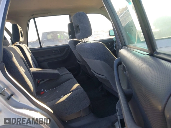 1999 Honda CR-V LX with VIN JHLRD284XXC019021, listed as a IAAI auction lot 41031098 with 204,206 mi miles. Bid and sale history available at carsss.com. Image 8.