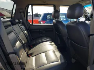 2004 Ford Explorer Sport Trac XLS z VIN 1FMDU77K74UB69268, wystawiony jako IAAI lot #42055157 z przebiegiem 127 573 mil mil oraz . Historia ofert i sprzedaży dostępna na DreamBid. Obrazek 8.