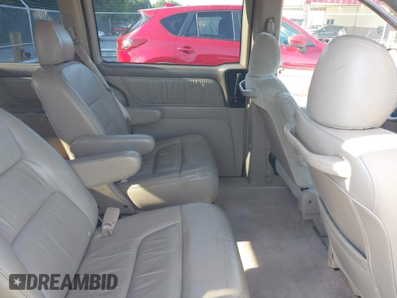 2004 Honda Odyssey EX-L with VIN 5FNRL18044B072819, listed as a IAAI auction lot 42441279 with 264,950 mi miles and . Bid and sale history available at DreamBid. Image 8.