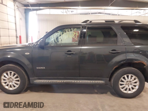 2008 Mercury Mariner Premier with VIN 4M2CU97168KJ20982, listed as a IAAI auction lot 41999498 with 151,524 mi miles and . Bid and sale history available at DreamBid. Image 14.